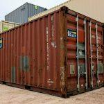 Side and corner view of used 20 foot shipping container