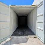 Open doors of 40 foot one trip container showing wood floor