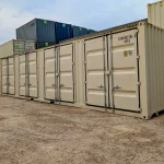 Row of 20 foot one trip storage containers